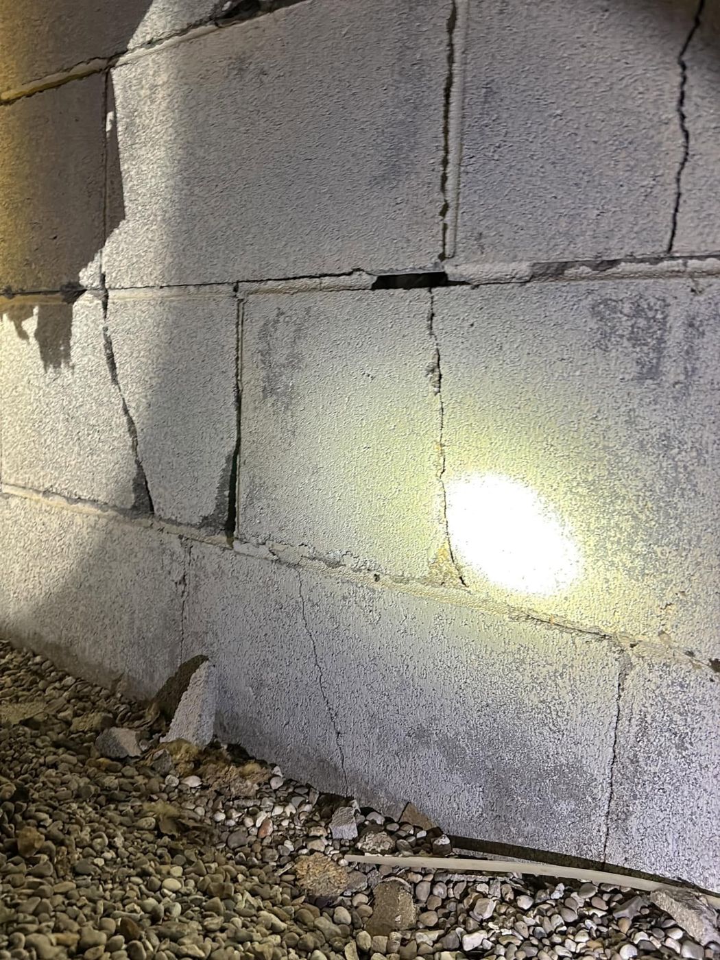 Cracked, shifted block wall